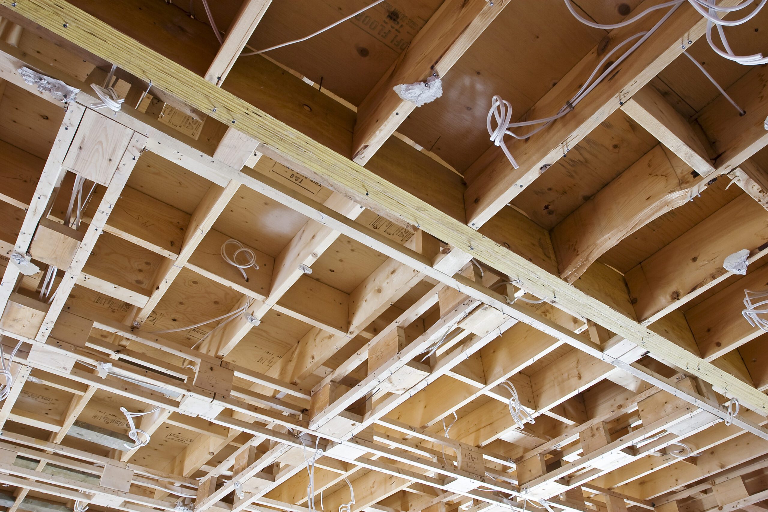 Bare,Walls,And,Structure,Of,A,Generic,House,Being,Built Downtown building lights